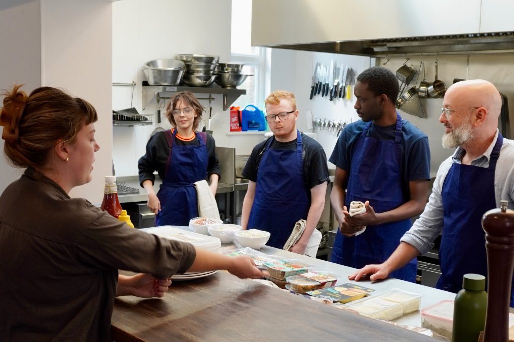 young people learning about food and hospitality at the perfect place to grow test kitchen 