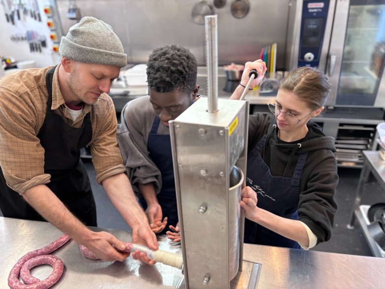 young people working in the kitchen 